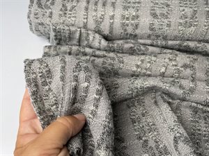 Polyesterjersey - blød og grå med mønster